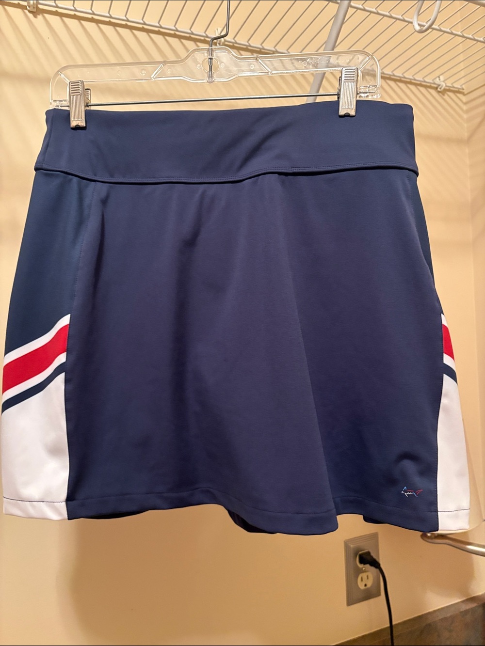 Greg Norman Collection Navy Skort with Red & White Side Stripes